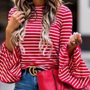 Loose ruffle flare sleeve blouse.
